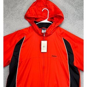 Reebok Jacket Men 2XL Orange Black Windbreaker Packable Hood Water Repellant NEW